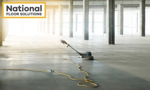 Commercial Floor Refinishing - image is a large commercial area with a concrete finishing machine in the middle of it