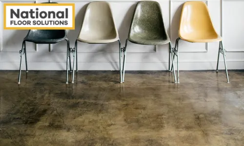 Polished Concrete - Image is a polished concrete floor with multicolor chairs on it